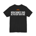 Black Dance Dads t-shirt, back print reading "NEW DANCE DAD BE PATIENT WITH ME", Dance Dads mark under the collar