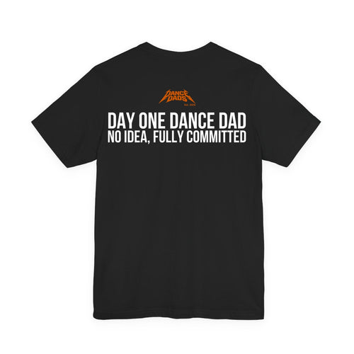 Black Dance Dads t-shirt, back print reading "DAY ONE DANCE DAD NO IDEA, FULLY COMMITTED", Dance Dads mark under the collar