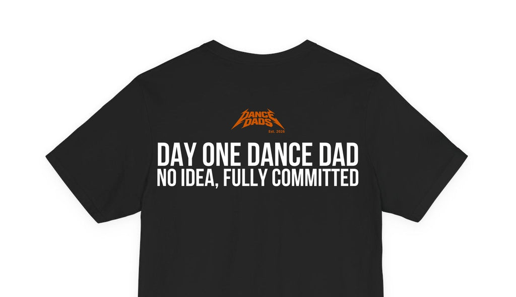Close-up of the "Day One Dance Dad: No Idea, Fully Committed" back print
