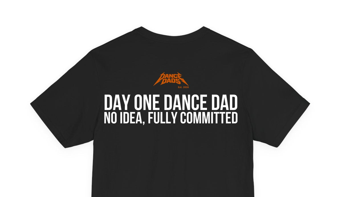 Close-up of the "Day One Dance Dad: No Idea, Fully Committed" back print