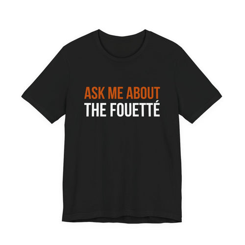 Black Dance Dads t-shirt printed with "ASK ME ABOUT THE FOUETTÉ" in burnt orange and white across the chest