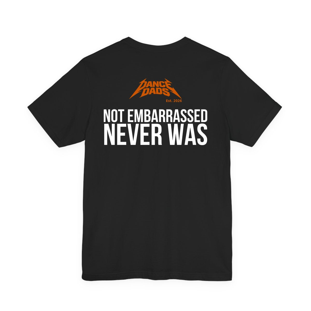 Black Dance Dads tee with "Not Embarrassed. Never Was." printed across the back